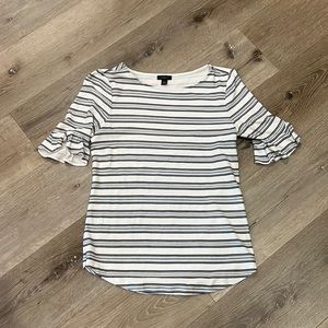 White with black and blue strips